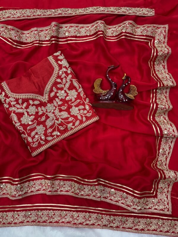 red rangoli silk saree embroidery detail